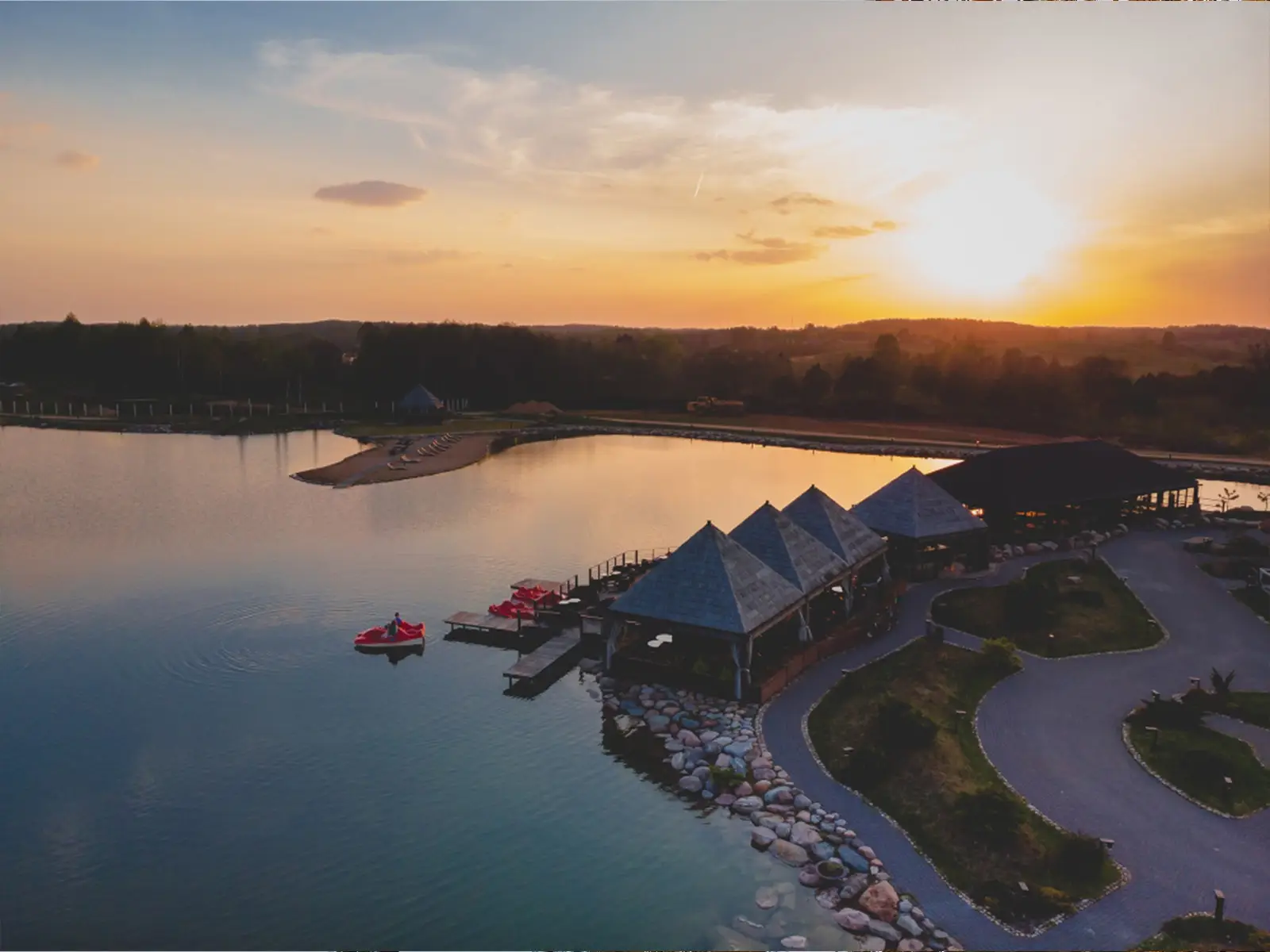 Luxury lakefront home at sunset in the Shuswap near Salmon Arm, British Columbia